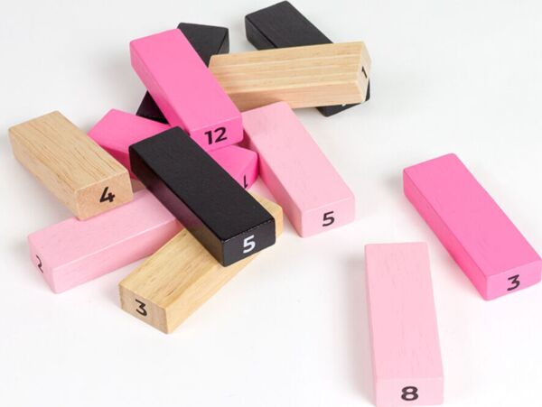 Erotikspiel Secret Play Tower of Sex mit dem Turm aus Holzsteinen in vier Farben und den Würfeln